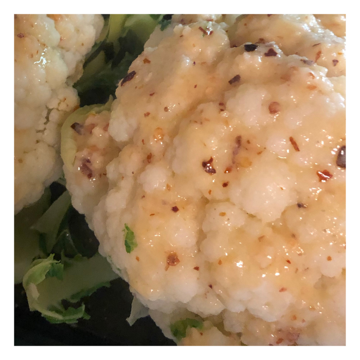 Whole head roasted cauliflower is a delicious dish. It’s easy to make, and guaranteed to impress!